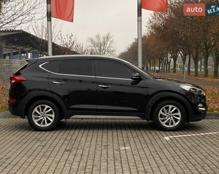 Черный Хендай Туксон, объемом двигателя 2 л и пробегом 106 тыс. км за 19500 $, фото 3 на Automoto.ua