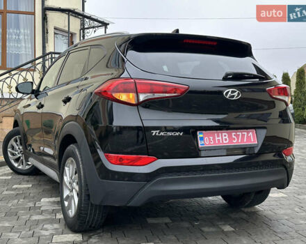 Черный Хендай Туксон, объемом двигателя 2 л и пробегом 156 тыс. км за 12800 $, фото 23 на Automoto.ua