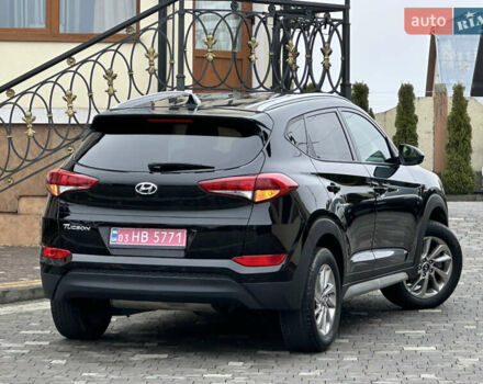 Черный Хендай Туксон, объемом двигателя 2 л и пробегом 156 тыс. км за 12800 $, фото 63 на Automoto.ua