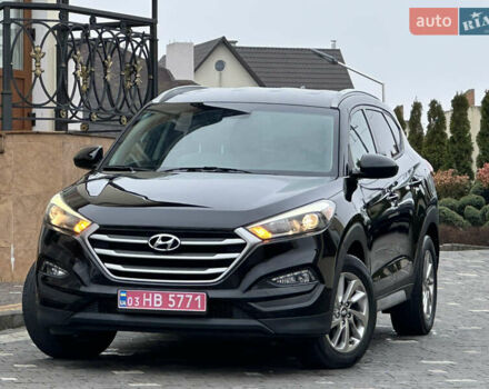 Черный Хендай Туксон, объемом двигателя 2 л и пробегом 156 тыс. км за 12800 $, фото 2 на Automoto.ua