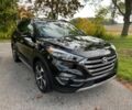 Черный Хендай Туксон, объемом двигателя 1.6 л и пробегом 34 тыс. км за 19000 $, фото 1 на Automoto.ua
