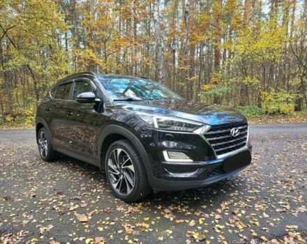 Чорний Хендай Туксон, об'ємом двигуна 2 л та пробігом 135 тис. км за 13500 $, фото 3 на Automoto.ua
