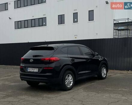Черный Хендай Туксон, объемом двигателя 2 л и пробегом 115 тыс. км за 18000 $, фото 3 на Automoto.ua