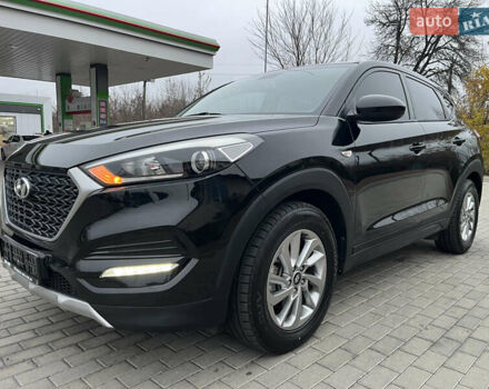 Черный Хендай Туксон, объемом двигателя 1.69 л и пробегом 134 тыс. км за 21800 $, фото 2 на Automoto.ua