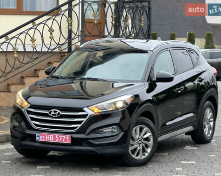 Черный Хендай Туксон, объемом двигателя 2 л и пробегом 156 тыс. км за 12800 $, фото 5 на Automoto.ua