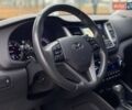Черный Хендай Туксон, объемом двигателя 2 л и пробегом 106 тыс. км за 19500 $, фото 9 на Automoto.ua
