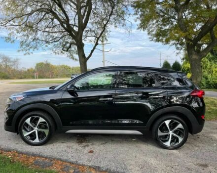 Черный Хендай Туксон, объемом двигателя 1.6 л и пробегом 34 тыс. км за 19000 $, фото 2 на Automoto.ua