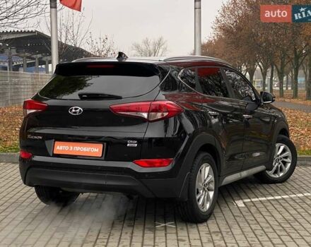 Черный Хендай Туксон, объемом двигателя 2 л и пробегом 106 тыс. км за 19500 $, фото 5 на Automoto.ua