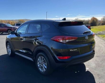 Чорний Хендай Туксон, об'ємом двигуна 2 л та пробігом 48 тис. км за 10800 $, фото 4 на Automoto.ua