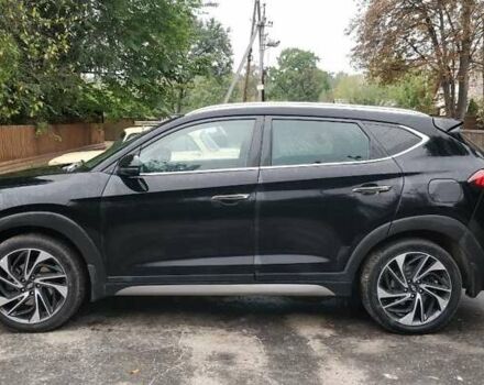 Чорний Хендай Туксон, об'ємом двигуна 2 л та пробігом 91 тис. км за 25000 $, фото 2 на Automoto.ua