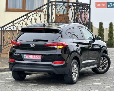 Черный Хендай Туксон, объемом двигателя 2 л и пробегом 156 тыс. км за 12800 $, фото 48 на Automoto.ua