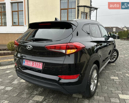 Черный Хендай Туксон, объемом двигателя 2 л и пробегом 156 тыс. км за 12800 $, фото 60 на Automoto.ua