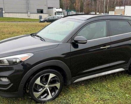 Черный Хендай Туксон, объемом двигателя 1.6 л и пробегом 65 тыс. км за 12600 $, фото 5 на Automoto.ua