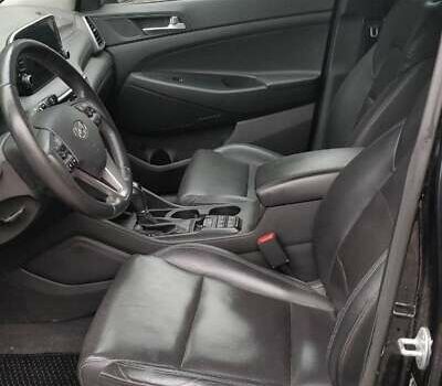 Чорний Хендай Туксон, об'ємом двигуна 2 л та пробігом 91 тис. км за 25000 $, фото 10 на Automoto.ua