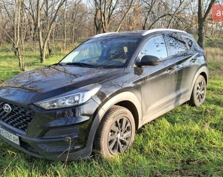 Черный Хендай Туксон, объемом двигателя 2 л и пробегом 101 тыс. км за 19700 $, фото 1 на Automoto.ua
