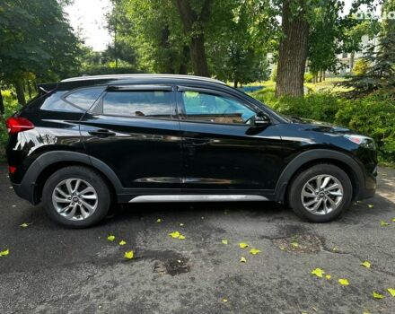 Черный Хендай Туксон, объемом двигателя 2 л и пробегом 109 тыс. км за 18490 $, фото 3 на Automoto.ua