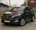 Черный Хендай Туксон, объемом двигателя 2 л и пробегом 106 тыс. км за 19500 $, фото 1 на Automoto.ua