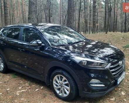 Черный Хендай Туксон, объемом двигателя 2 л и пробегом 100 тыс. км за 17200 $, фото 2 на Automoto.ua