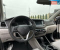 Черный Хендай Туксон, объемом двигателя 2 л и пробегом 156 тыс. км за 12800 $, фото 71 на Automoto.ua