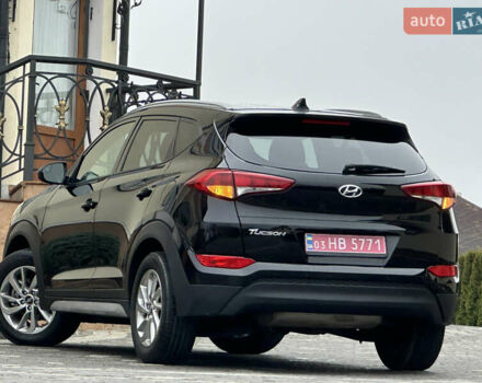 Черный Хендай Туксон, объемом двигателя 2 л и пробегом 156 тыс. км за 12800 $, фото 18 на Automoto.ua