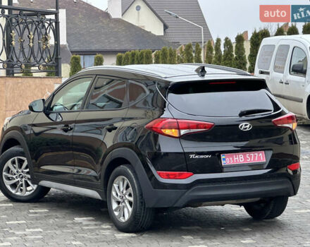 Черный Хендай Туксон, объемом двигателя 2 л и пробегом 156 тыс. км за 12800 $, фото 20 на Automoto.ua