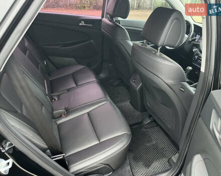 Черный Хендай Туксон, объемом двигателя 1.69 л и пробегом 134 тыс. км за 21800 $, фото 29 на Automoto.ua