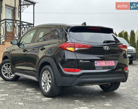 Черный Хендай Туксон, объемом двигателя 2 л и пробегом 156 тыс. км за 12800 $, фото 22 на Automoto.ua