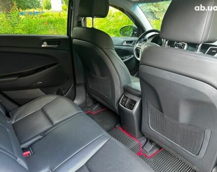 Черный Хендай Туксон, объемом двигателя 2 л и пробегом 109 тыс. км за 18490 $, фото 23 на Automoto.ua
