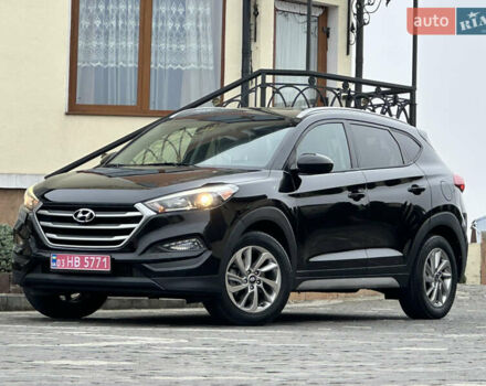Черный Хендай Туксон, объемом двигателя 2 л и пробегом 156 тыс. км за 12800 $, фото 16 на Automoto.ua