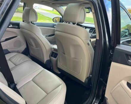 Черный Хендай Туксон, объемом двигателя 1.6 л и пробегом 34 тыс. км за 19000 $, фото 12 на Automoto.ua