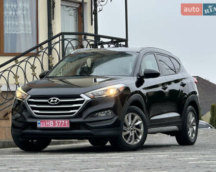 Черный Хендай Туксон, объемом двигателя 2 л и пробегом 156 тыс. км за 12800 $, фото 1 на Automoto.ua