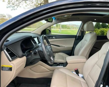 Черный Хендай Туксон, объемом двигателя 1.6 л и пробегом 34 тыс. км за 19000 $, фото 9 на Automoto.ua