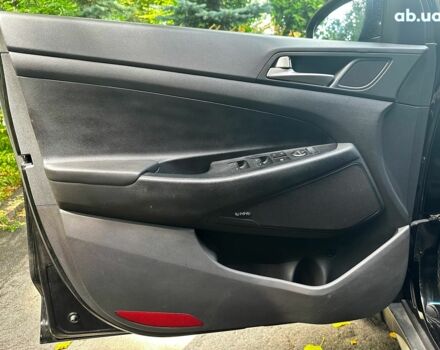 Черный Хендай Туксон, объемом двигателя 2 л и пробегом 109 тыс. км за 18490 $, фото 8 на Automoto.ua