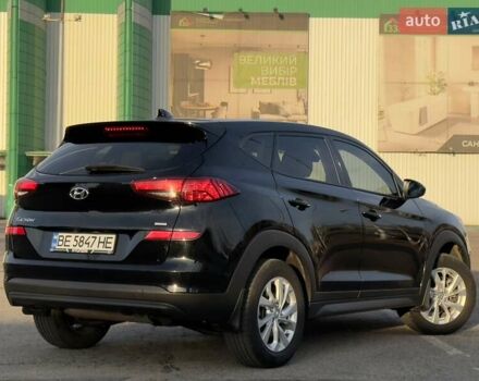 Черный Хендай Туксон, объемом двигателя 2 л и пробегом 127 тыс. км за 18900 $, фото 1 на Automoto.ua