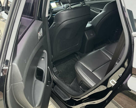 Черный Хендай Туксон, объемом двигателя 1.69 л и пробегом 134 тыс. км за 21800 $, фото 21 на Automoto.ua