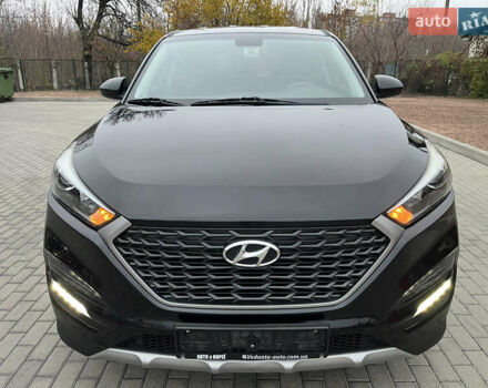 Черный Хендай Туксон, объемом двигателя 1.69 л и пробегом 134 тыс. км за 21800 $, фото 1 на Automoto.ua