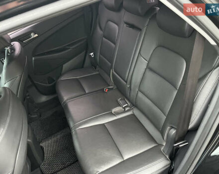 Черный Хендай Туксон, объемом двигателя 1.69 л и пробегом 134 тыс. км за 21800 $, фото 22 на Automoto.ua