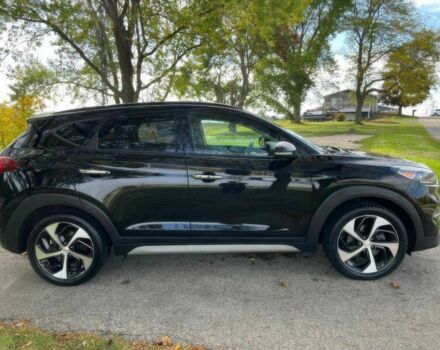 Черный Хендай Туксон, объемом двигателя 1.6 л и пробегом 34 тыс. км за 19000 $, фото 6 на Automoto.ua