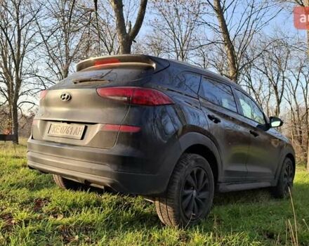 Черный Хендай Туксон, объемом двигателя 2 л и пробегом 101 тыс. км за 19700 $, фото 2 на Automoto.ua