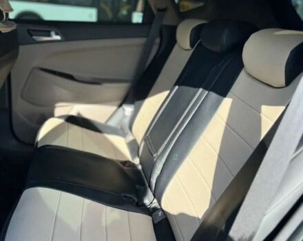 Черный Хендай Туксон, объемом двигателя 2 л и пробегом 108 тыс. км за 10000 $, фото 10 на Automoto.ua