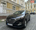 Черный Хендай Туксон, объемом двигателя 2 л и пробегом 100 тыс. км за 16900 $, фото 1 на Automoto.ua