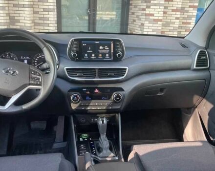 Черный Хендай Туксон, объемом двигателя 2 л и пробегом 119 тыс. км за 9900 $, фото 5 на Automoto.ua