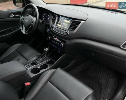 Черный Хендай Туксон, объемом двигателя 1.69 л и пробегом 134 тыс. км за 21800 $, фото 26 на Automoto.ua