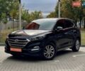 Черный Хендай Туксон, объемом двигателя 2 л и пробегом 106 тыс. км за 19900 $, фото 1 на Automoto.ua
