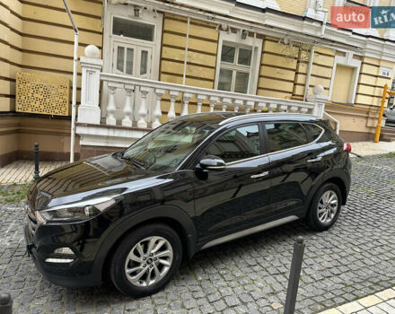 Черный Хендай Туксон, объемом двигателя 2 л и пробегом 100 тыс. км за 16900 $, фото 2 на Automoto.ua