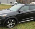 Черный Хендай Туксон, объемом двигателя 1.6 л и пробегом 65 тыс. км за 12600 $, фото 1 на Automoto.ua