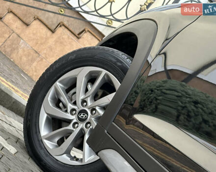 Черный Хендай Туксон, объемом двигателя 2 л и пробегом 156 тыс. км за 12800 $, фото 25 на Automoto.ua