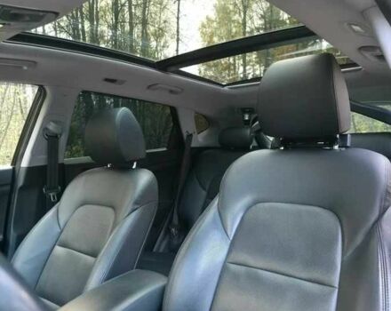 Чорний Хендай Туксон, об'ємом двигуна 2 л та пробігом 135 тис. км за 13500 $, фото 9 на Automoto.ua