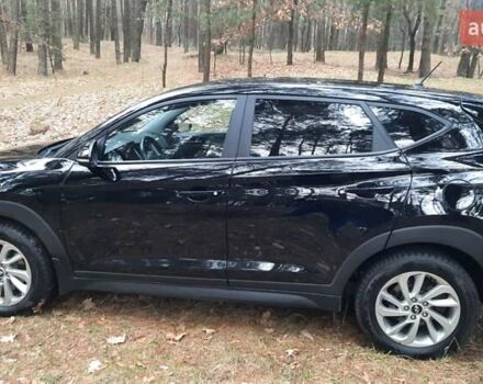 Черный Хендай Туксон, объемом двигателя 2 л и пробегом 100 тыс. км за 17200 $, фото 6 на Automoto.ua