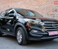 Чорний Хендай Туксон, об'ємом двигуна 2 л та пробігом 159 тис. км за 12300 $, фото 1 на Automoto.ua